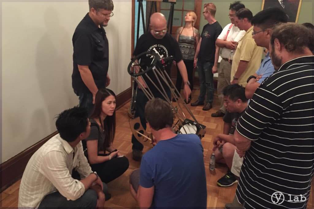 YLab Inspecting The Homemade Telescopes